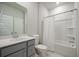Modern bathroom featuring a shower-tub combination, vanity, and tile floors at 127 Oyster Tide Ave, Summerville, SC 29485