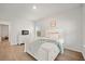 Comfortable bedroom features a soft color palette and a dresser with a mounted TV at 127 Oyster Tide Ave, Summerville, SC 29485