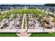 Aerial view of a common area with seating, palm trees, and recreational spaces at 127 Oyster Tide Ave, Summerville, SC 29485