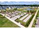 Aerial perspective of the community featuring a scenic pond and inviting recreation area at 127 Oyster Tide Ave, Summerville, SC 29485