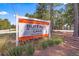 Community sign displaying the neighborhood name, Buffalo Lake, and address along Summers Dr at 127 Oyster Tide Ave, Summerville, SC 29485