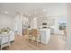 Modern kitchen with a center island, stainless steel appliances, and bar stool seating at 127 Oyster Tide Ave, Summerville, SC 29485