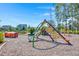 Community playground with unique climbing structures and play areas for residents to enjoy at 127 Oyster Tide Ave, Summerville, SC 29485