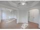 Large primary bedroom with tray ceiling and carpet flooring at 1338 Hopton Cir, Mount Pleasant, SC 29466