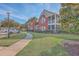 Beautiful two-story building with red brick, a sidewalk and landscaping at 1338 Hopton Cir, Mount Pleasant, SC 29466