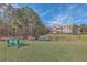 Beautiful condo community with lush landscaping and a tranquil pond with a fountain feature at 1338 Hopton Cir, Mount Pleasant, SC 29466