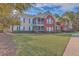 Inviting exterior view of the building showcasing a well-maintained lawn and patio at 1338 Hopton Cir, Mount Pleasant, SC 29466