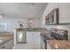 Well-lit kitchen features granite countertops and stainless steel appliances at 1338 Hopton Cir, Mount Pleasant, SC 29466
