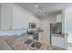 Bright kitchen features granite countertops, stainless steel appliances, and white cabinetry at 1338 Hopton Cir, Mount Pleasant, SC 29466