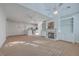 Open-concept living space with a fireplace, built-in cabinets, and kitchen view at 1338 Hopton Cir, Mount Pleasant, SC 29466