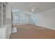 Spacious living room with high ceilings, a fireplace, and built-in shelves at 1338 Hopton Cir, Mount Pleasant, SC 29466