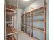 Walk-in pantry with wooden shelving for optimal storage at 1338 Hopton Cir, Mount Pleasant, SC 29466