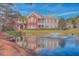 Scenic pond reflecting building with a fountain in the center at 1338 Hopton Cir, Mount Pleasant, SC 29466