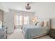 Comfortable bedroom with a queen bed, soft lighting, and neutral decor at 136 Post Mill Dr, Summerville, SC 29485