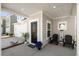 Inviting porch showcasing outdoor seating, a 'Welcome' sign, and decorative plants near the entrance at 136 Post Mill Dr, Summerville, SC 29485