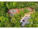 Aerial view of tennis courts with adjacent parking showcases the community's recreational amenities and convenience at 1425 Lagoon Park Cir, Mount Pleasant, SC 29466