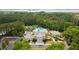 The community clubhouse and pool are nestled in a lush landscape with mature trees and ample parking at 1425 Lagoon Park Cir, Mount Pleasant, SC 29466
