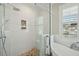 Modern bathroom with glass enclosed shower, soaking tub and white subway tile at 1425 Lagoon Park Cir, Mount Pleasant, SC 29466
