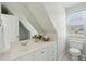 Bright bathroom with a modern vanity, a large mirror, and natural light from the window at 1425 Lagoon Park Cir, Mount Pleasant, SC 29466