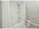 Bright, newly renovated bathroom with a shower-tub combo, white subway tile, and modern fixtures at 1425 Lagoon Park Cir, Mount Pleasant, SC 29466