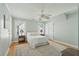Bright bedroom with a ceiling fan, hardwood floors, and dual windows with views at 1425 Lagoon Park Cir, Mount Pleasant, SC 29466