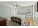 Cozy bedroom with a bed, hardwood floors, and bright windows with blinds at 1425 Lagoon Park Cir, Mount Pleasant, SC 29466