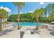 Resort-style pool with lounge chairs and palm trees providing a relaxing oasis for residents and guests at 1425 Lagoon Park Cir, Mount Pleasant, SC 29466