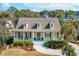 Charming two-story home with a welcoming front porch, manicured landscaping, and a classic design at 1425 Lagoon Park Cir, Mount Pleasant, SC 29466