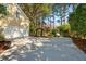 Spacious driveway leading to a well-maintained home, featuring lush landscaping and a welcoming garage at 1425 Lagoon Park Cir, Mount Pleasant, SC 29466