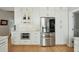 Kitchen area features stainless steel appliances, custom cabinetry, and provides ample storage and modern convenience at 1425 Lagoon Park Cir, Mount Pleasant, SC 29466