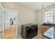 Spacious laundry room featuring modern appliances, ample counter space, and bright lighting at 1425 Lagoon Park Cir, Mount Pleasant, SC 29466