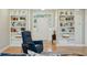 Inviting living room with custom bookshelves flanking the entryway and plenty of natural light at 1425 Lagoon Park Cir, Mount Pleasant, SC 29466