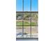 Scenic view of a pond and neighboring houses through a window with white framing at 1425 Lagoon Park Cir, Mount Pleasant, SC 29466