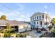 Aerial view of a home showcasing it's roof, outdoor living space and proximity to the neighborhood at 146 S Battery St, Charleston, SC 29401