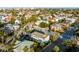 Expansive aerial view showing a beautiful neighborhood with many homes and tree-lined streets, overlooking downtown at 146 S Battery St, Charleston, SC 29401