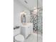 Bathroom with white subway tile, patterned shower, and modern fixtures at 146 S Battery St, Charleston, SC 29401