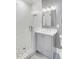 Modern bathroom featuring mosaic tile floor, stylish vanity, and white subway tile shower at 146 S Battery St, Charleston, SC 29401