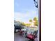 Relaxing outdoor deck featuring a grill, table and chairs, and a view of palm trees at 146 S Battery St, Charleston, SC 29401