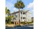 Charming two-story home with a double porch and professionally landscaped front yard, next to the street at 146 S Battery St, Charleston, SC 29401