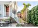 Exterior view with palm trees lining the walkway leading to the property at 146 S Battery St, Charleston, SC 29401