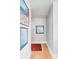 Hallway with wood floors and decorative artwork adding a touch of elegance at 146 S Battery St, Charleston, SC 29401