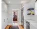 This kitchen features custom cabinets, stainless appliances, and a view of the backyard at 146 S Battery St, Charleston, SC 29401