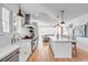 Bright open kitchen with a large island, stainless steel appliances, and plenty of storage at 146 S Battery St, Charleston, SC 29401