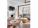Bright living room featuring a fireplace, modern furnishings, and a stylish area rug at 146 S Battery St, Charleston, SC 29401