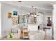 Spacious living room blends seamlessly with the modern kitchen featuring colorful art and a center island at 146 S Battery St, Charleston, SC 29401