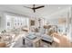 Living room with gray sofa, decorative pillows, and stylish decor at 146 S Battery St, Charleston, SC 29401