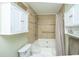 Cozy bathroom featuring a tub/shower combo and built in storage at 1466 Arrow Wind Ter, Charleston, SC 29414