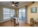 Bright dining area with natural light and sliding glass doors to the deck, perfect for meals at 1466 Arrow Wind Ter, Charleston, SC 29414