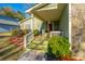 Inviting front porch with decorative stone accents and green-painted stairs, creating a welcoming entrance at 1466 Arrow Wind Ter, Charleston, SC 29414