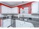 This modern kitchen offers granite countertops, stainless steel appliances, and ample cabinet space at 1466 Arrow Wind Ter, Charleston, SC 29414